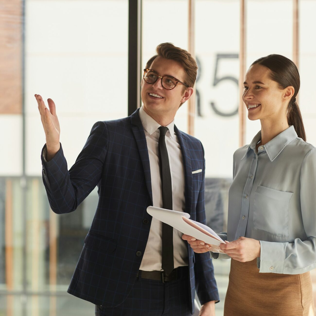 Real Estate Agent Showing Commercial Property